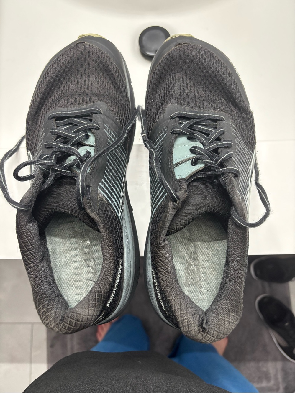 Altra Women's Black Athletic Shoes with Light Blue Accents